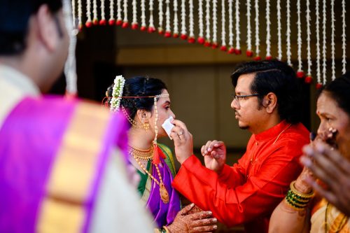 Brother wiping tears of bride during Maharashtrian wedding ceremony at Hyatt Pune
