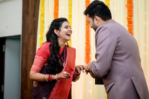 to be bride laughing during engagement ceremony candid moment