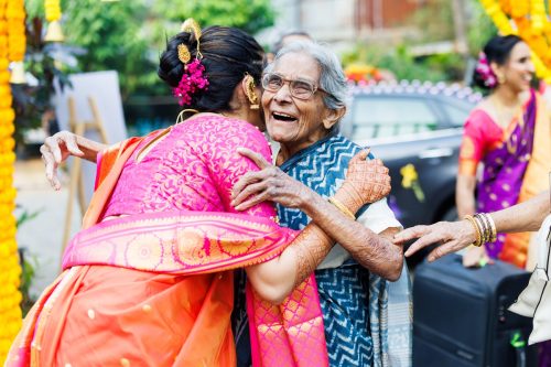 Bride hugging her grandmother during a maharashtrian wedding ceremony in Pune