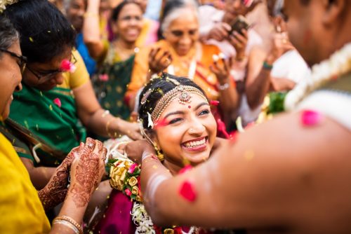 tamil brahmin bride emotionally smiling during tali mangalsutra ceremony