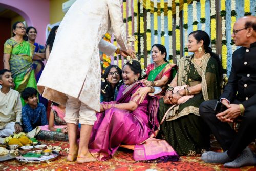 bride laughing during papadam wedding game tamil wedding