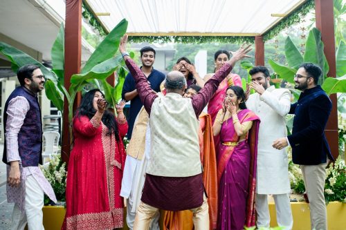 Bride’s uncle photobombing as cousins laugh during Marathi wedding at Ambrosia Pune